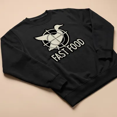 Vintage distressed Duck Hunter t-shirt featuring the text FAST FOOD with a cartoon duck — printed on a unisex sweatshirt