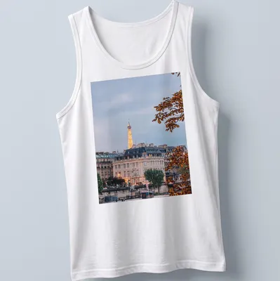 Photographic print of the Eiffel Tower with a Paris cityscape in gray, gold, green, and brown — printed on a tank top
