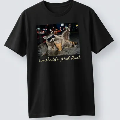 Photorealistic raccoon holding a coffee cup with the phrase 'somebody's feral Aunt' above it. — printed on a unisex t-shirt
