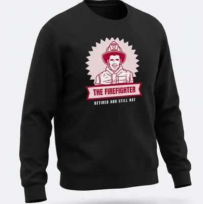 Bold illustration of a firefighter with text 'THE FIREFIGHTER' in red and light pink — printed on a unisex sweatshirt