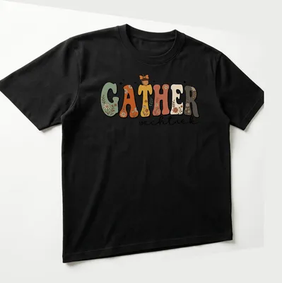 Cottagecore style t-shirt featuring floral autumn design with the word GATHER vechtick — printed on a unisex t-shirt (angled view)