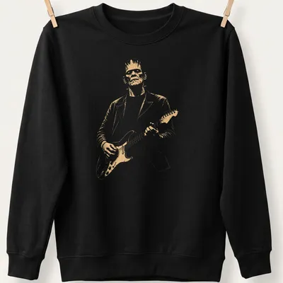 Vintage style Frankenstein playing guitar in white, gold, and black — printed on a unisex sweatshirt