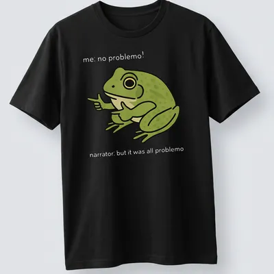 Cartoon frog meme t-shirt with the text 'me, no problemo!' underneath — printed on a unisex t-shirt