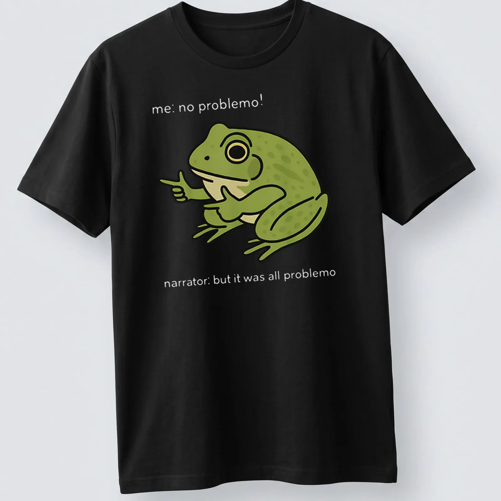 Cartoon frog meme t-shirt with the text 'me, no problemo!' underneath — printed on a unisex t-shirt
