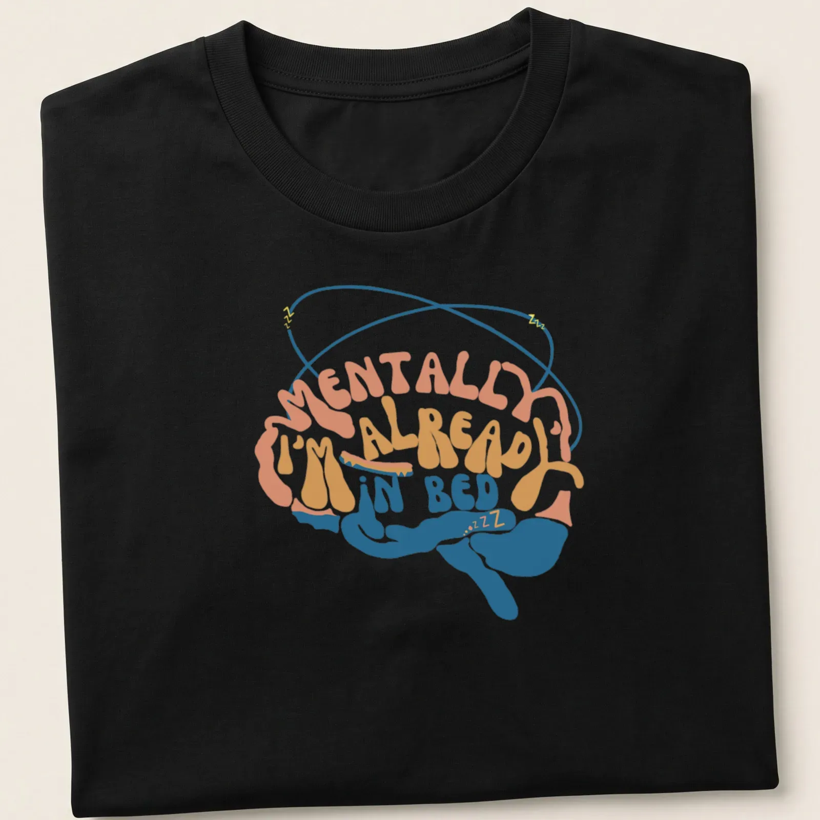 Retro T-shirt with colorful brain design and text about being in bed — printed on a unisex t-shirt