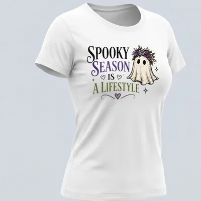 Whimsical ghost with floral crown and colorful text celebrating spooky season. — printed on a women's shirt