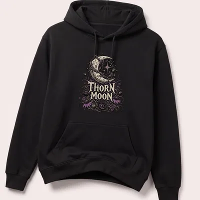 Gothic floral design featuring a crescent moon, thorns, and flowers in dark colors. — printed on a unisex hoodie