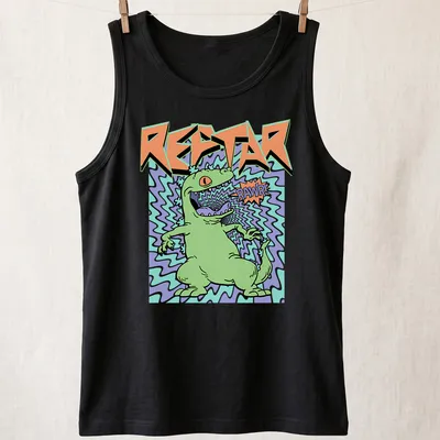 Cartoon green dinosaur roaring with text 'REPTAR RAWR!' in colorful print — printed on a tank top