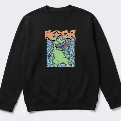 Cartoon green dinosaur roaring with text 'REPTAR RAWR!' in colorful print — printed on a unisex sweatshirt