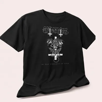 Black and white gothic graphic featuring a grotesque figure with text about evil. — printed on a unisex t-shirt (angled view)