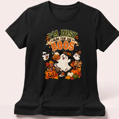 Kawaii illustration of a friendly ghost with pumpkins and candy saying I'm Just Here For The Boos — printed on a women's shirt