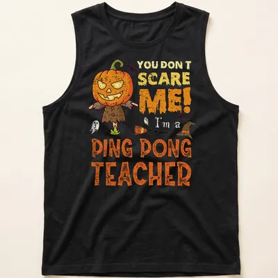 Cartoon pumpkin character with humorous text 'You Don't Scare Me! Ping Dong Teacher' in orange and black — printed on a tank top