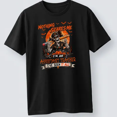 Vintage Halloween t-shirt featuring a skeleton teacher with sunglasses and humorous text.