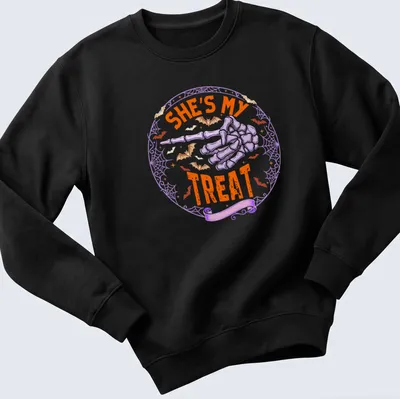 Playful Halloween t-shirt with skeleton hand and text She's My Treat — printed on a unisex sweatshirt
