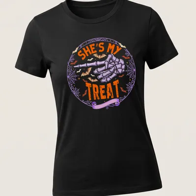 Playful Halloween t-shirt with skeleton hand and text She's My Treat — printed on a women's shirt