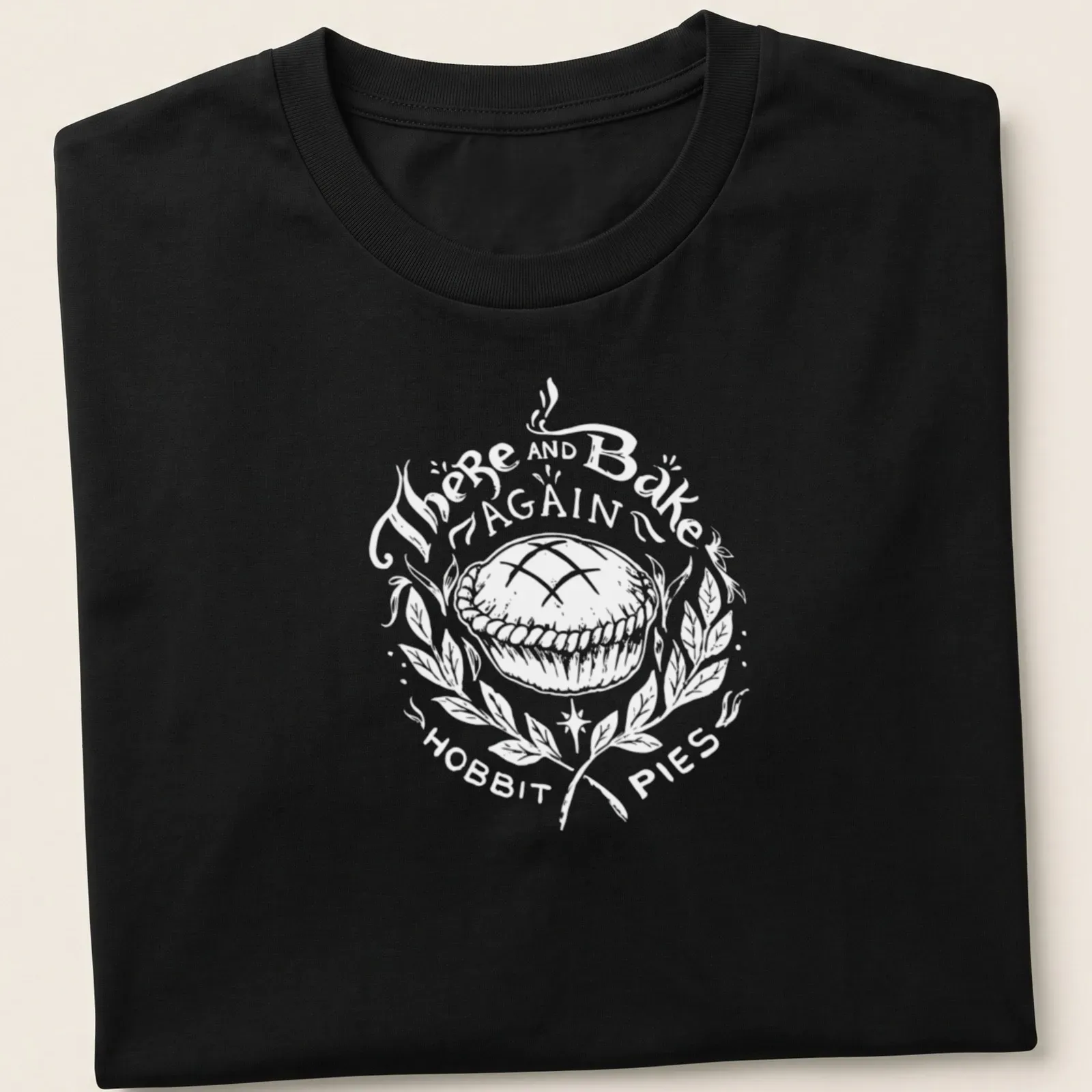 Hobbit-themed shirt with whimsical Hobbit Pies text — printed on a unisex t-shirt