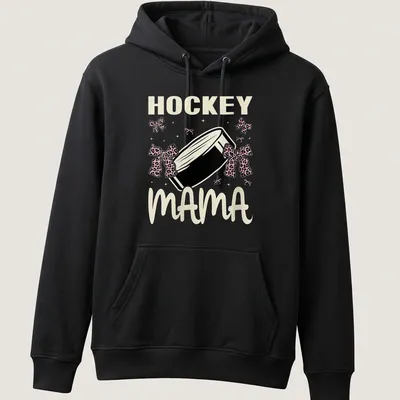 Illustration of a hockey puck with bows and text 'Hockey Mama' in playful style — printed on a unisex hoodie