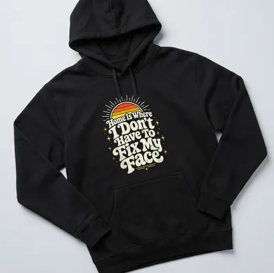 Retro distressed shirt with sunrise and text about comfort at home — printed on a unisex hoodie
