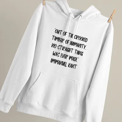 Immanuel Kant quote t-shirt with bold handwritten text in black on white — printed on a unisex hoodie