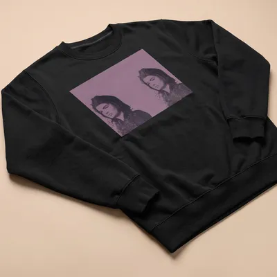 Pop Art t-shirt featuring Jacqueline Kennedy in purple, black, and white — printed on a unisex sweatshirt
