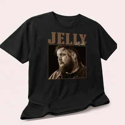 Sepia-toned Jelly Roll graphic with playful text in brown and beige — printed on a unisex t-shirt (angled view)