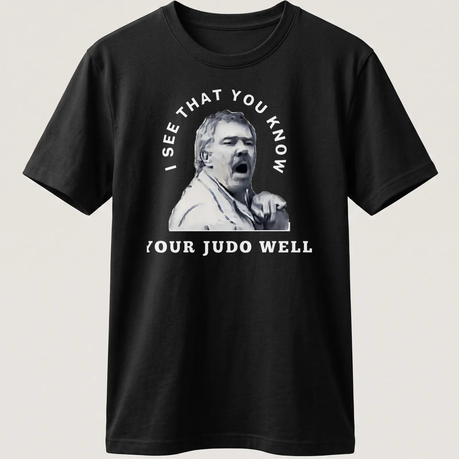 Stylized portrait of a passionate judo coach with motivational text — printed on a unisex t-shirt