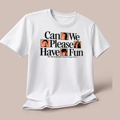 Bold graphic Kings of Leon album t-shirt in black, white, and orange — printed on a unisex t-shirt (angled view)