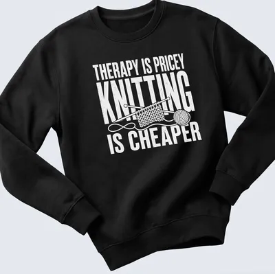 Bold typography t-shirt with humorous knitting statement in white — printed on a unisex sweatshirt