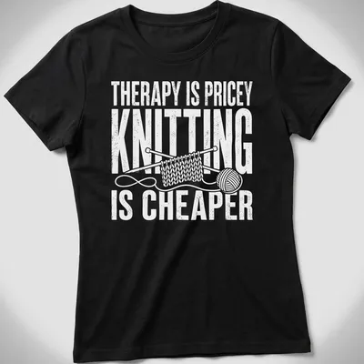 Bold typography t-shirt with humorous knitting statement in white — printed on a women's shirt
