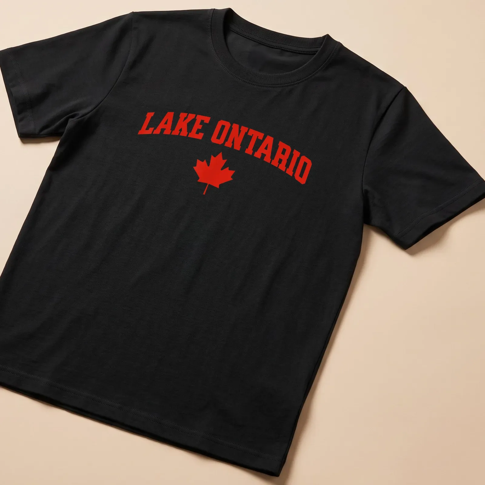 Bold Lake Ontario print with a maple leaf in striking red — printed on a unisex t-shirt