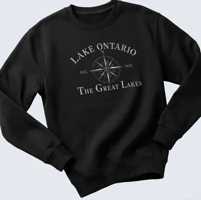 Vintage compass design featuring Lake Ontario history in black and white. — printed on a unisex sweatshirt