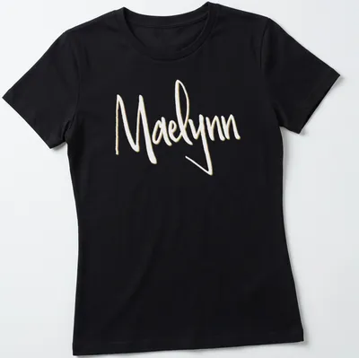 Personalized T-shirt with the name Maelynn in elegant gold script on white — printed on a women's shirt