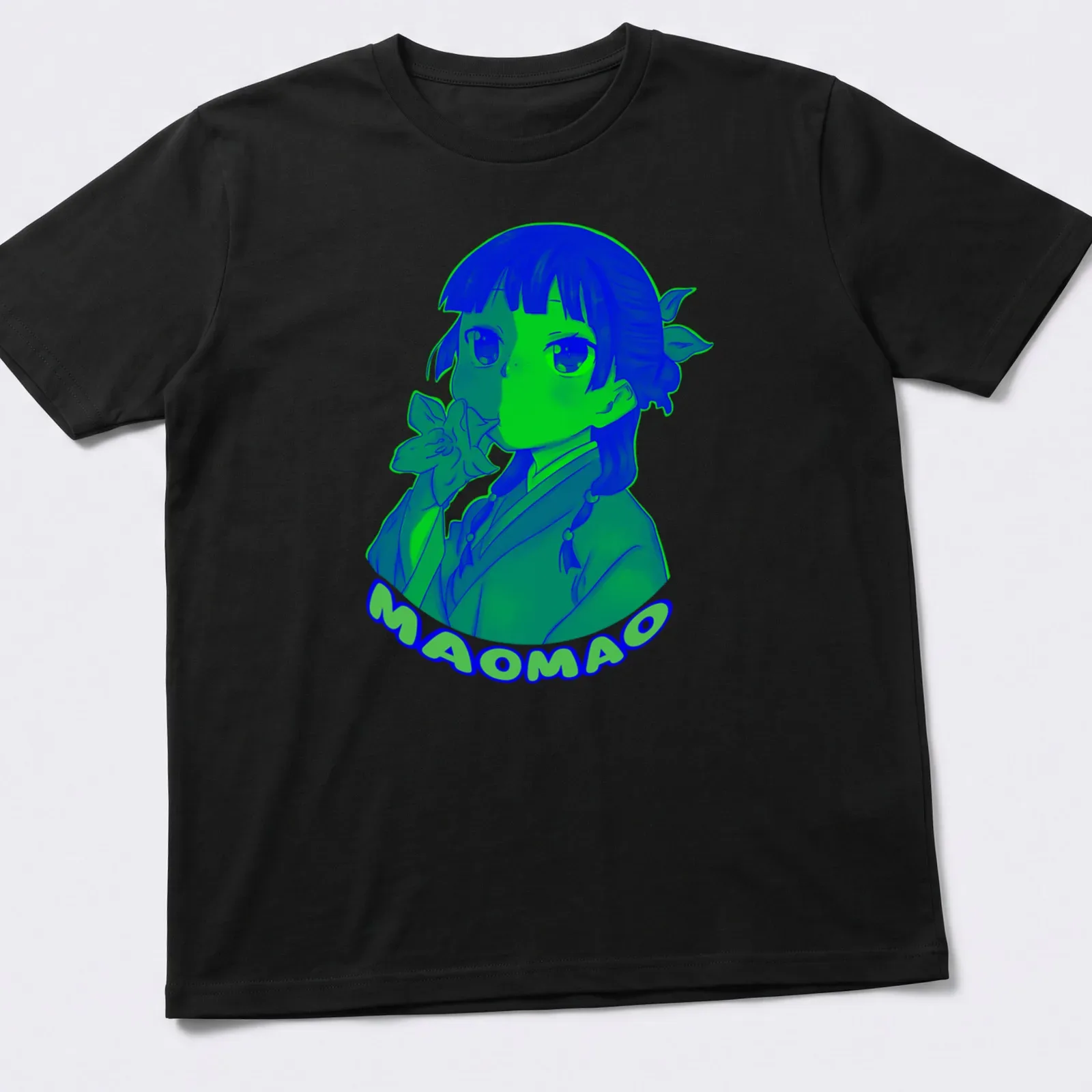 Colorful cartoon shirt featuring a playful doodle character with MAOMAO text — printed on a unisex t-shirt