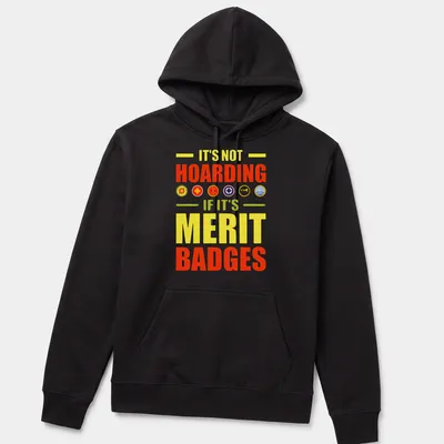 Bold typography T-shirt with colorful text about merit badges. — printed on a unisex hoodie
