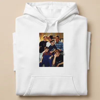 Photographic print of Season 1 family cast in black, blue, red, and white — printed on a unisex hoodie