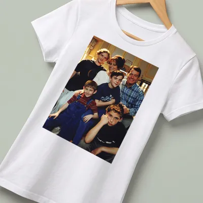 Photographic print of Season 1 family cast in black, blue, red, and white — printed on a women's shirt
