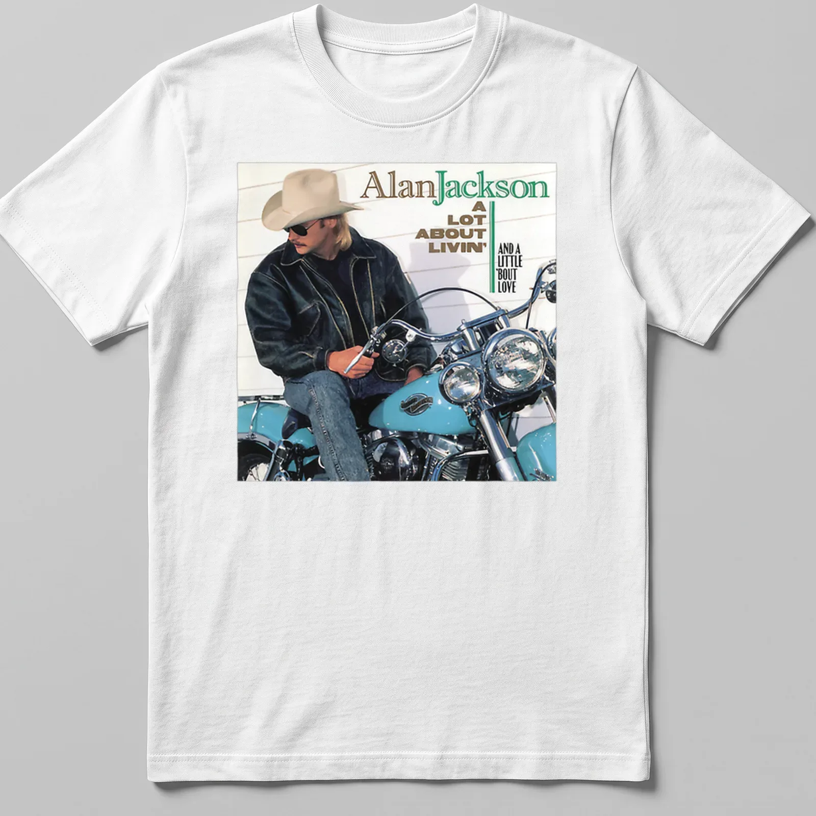 Vintage Alan Jackson tee featuring a motorcycle and lyrics in earthy tones — printed on a unisex t-shirt