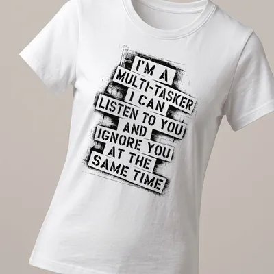 Bold typographic tee displaying humorous multitasking phrase in black and white — printed on a women's shirt