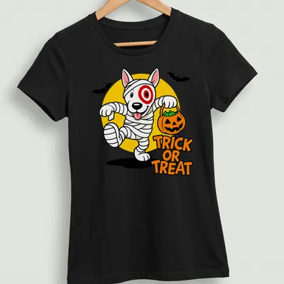 Cartoon mummy dog with pumpkin basket and Trick or Treat text in Halloween colors — printed on a women's shirt