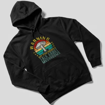 Retro distressed tee featuring a colorful mushroom and humorous warning text — printed on a unisex hoodie
