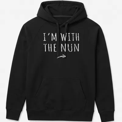 Bold printed text I'm With The Nun on a white t-shirt with a nun graphic — printed on a unisex hoodie