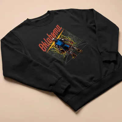 Vintage comic-style Oklahoma Skeleton Baller graphic with bold colors — printed on a unisex sweatshirt