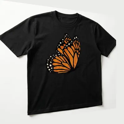 Watercolor print of an orange butterfly with intricate wings on a — printed on a unisex t-shirt (angled view)