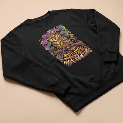 Colorful whimsical illustration of an owl with text about facial expressions — printed on a unisex sweatshirt