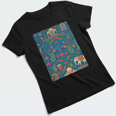 Doodle illustration of a peacock and elephant with floral patterns in vivid colors — printed on a women's shirt