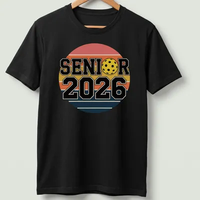 Retro pickleball graduation shirt with bold text and colorful graphics