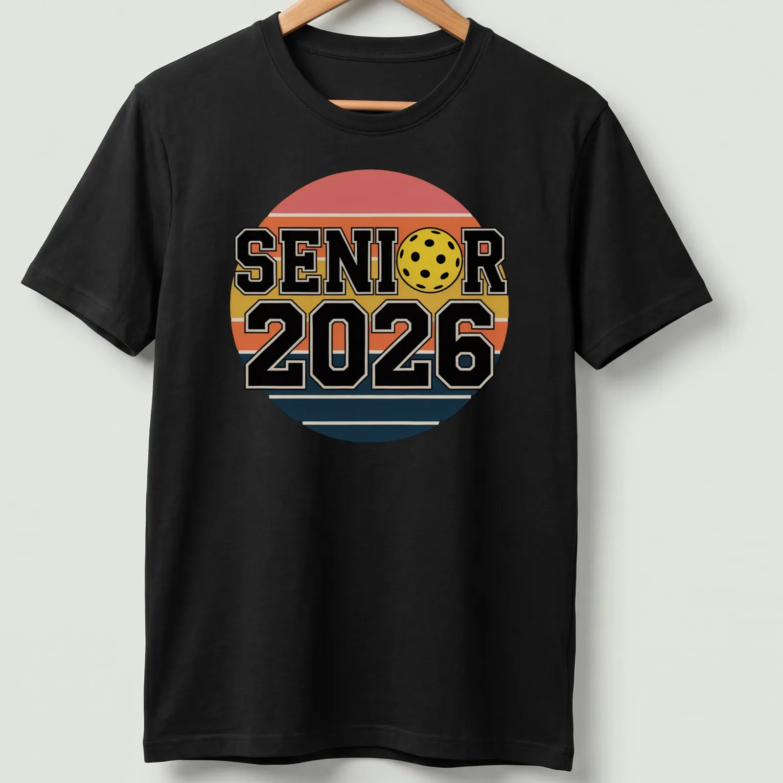 Retro pickleball graduation shirt with bold text and colorful graphics — printed on a unisex t-shirt