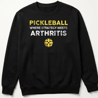 Bold and playful Pickleball humor shirt with yellow, white, and brown text — printed on a unisex sweatshirt