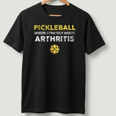 Bold and playful Pickleball humor shirt with yellow, white, and brown text