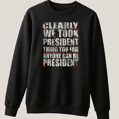 Grunge-style political humor t-shirt with bold text in red, white, and black — printed on a unisex sweatshirt